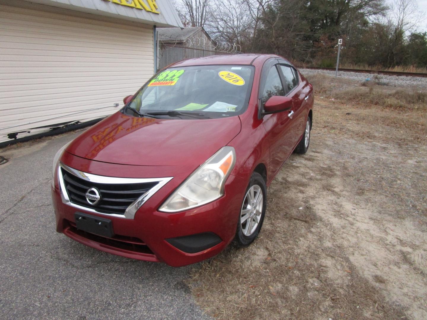 2016 Red Nissan Versa 1.6 S 5M (3N1CN7AP7GL) with an 1.6L L4 DOHC 16V engine, 5M transmission, located at 2553 Airline Blvd, Portsmouth, VA, 23701, (757) 488-8331, 36.813889, -76.357597 - Photo#1